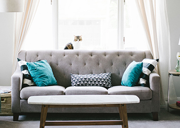 Living room with a white leather upholstery