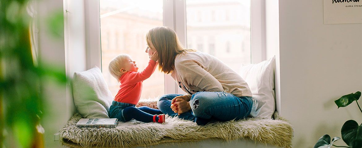 Happy Mother and child smiling